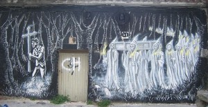 La Santa Compaña representado como graffiti realizado en una calle de Pontevedra